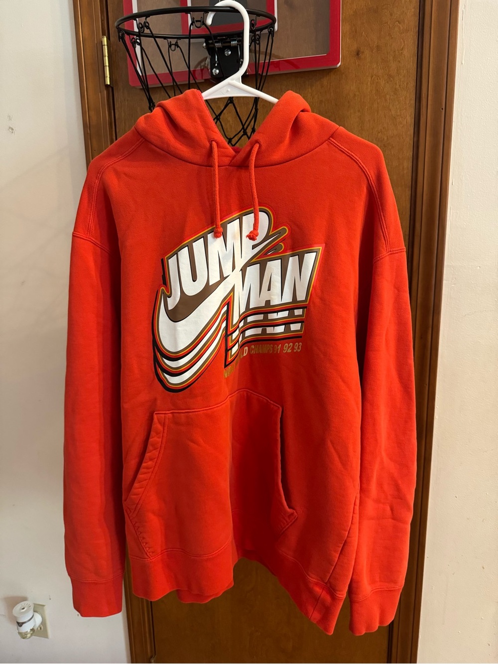 Jordan Orange Pullover Hoodie with White & Black Logo